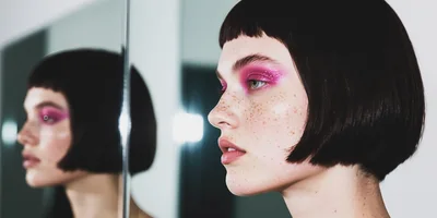 Portrait Of A Woman With Magenta Glitter Eyeshadow
