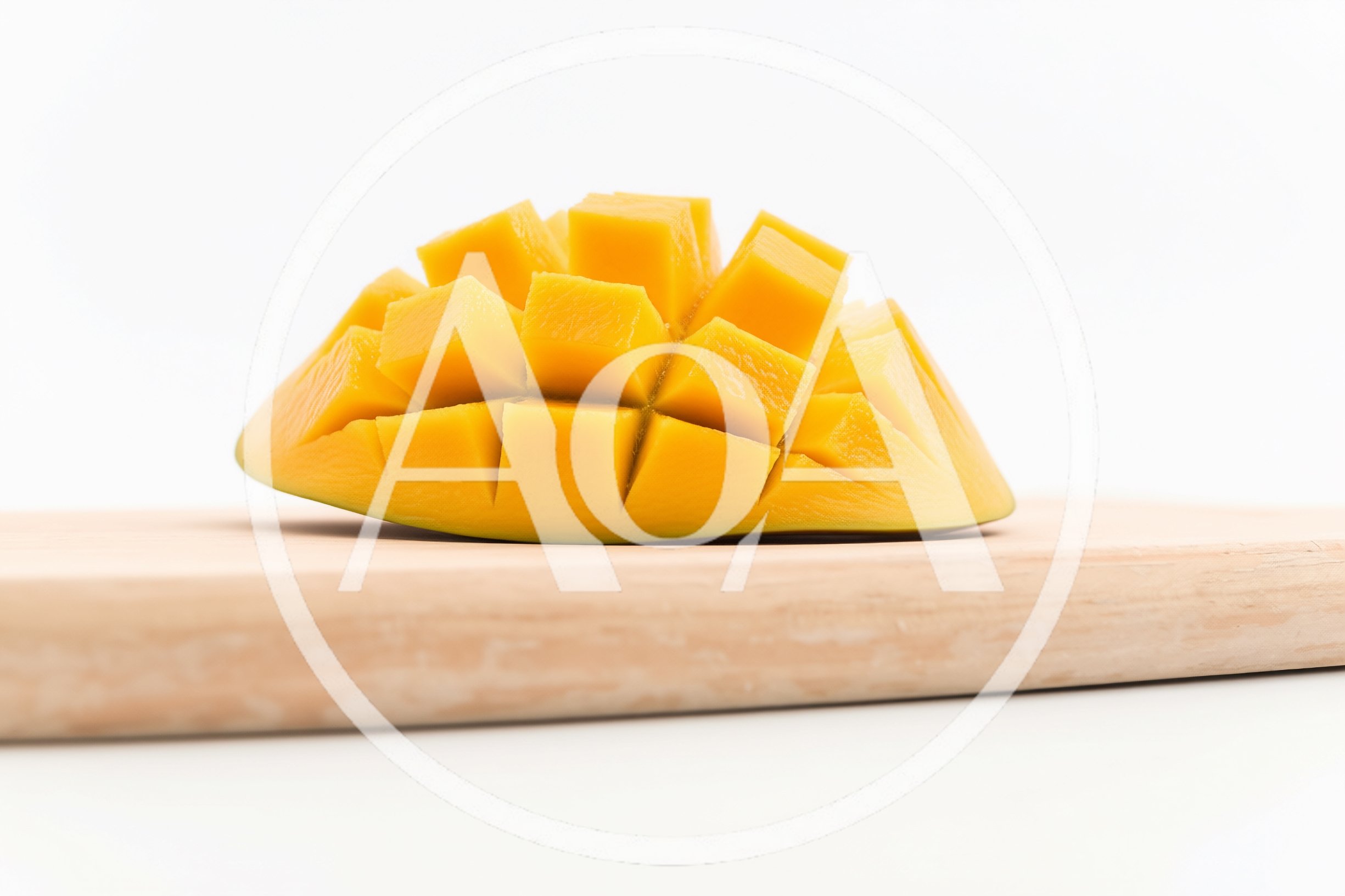 Fresh Mango Half Cubed on Wooden Cutting Board