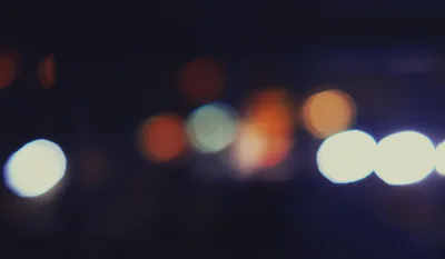 Abstract Blurred City Traffic Lights At Night