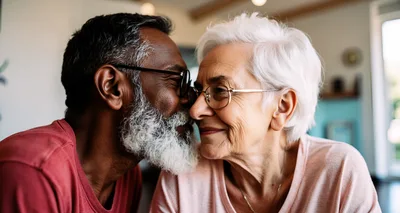 Senior Interracial Couple Sharing An Intimate Moment