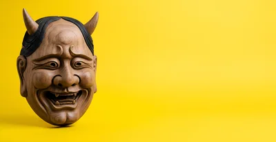Wooden Hannya Mask Isolated On Yellow Background