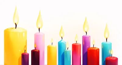 Colorful Lit Candles Arranged On A White Background