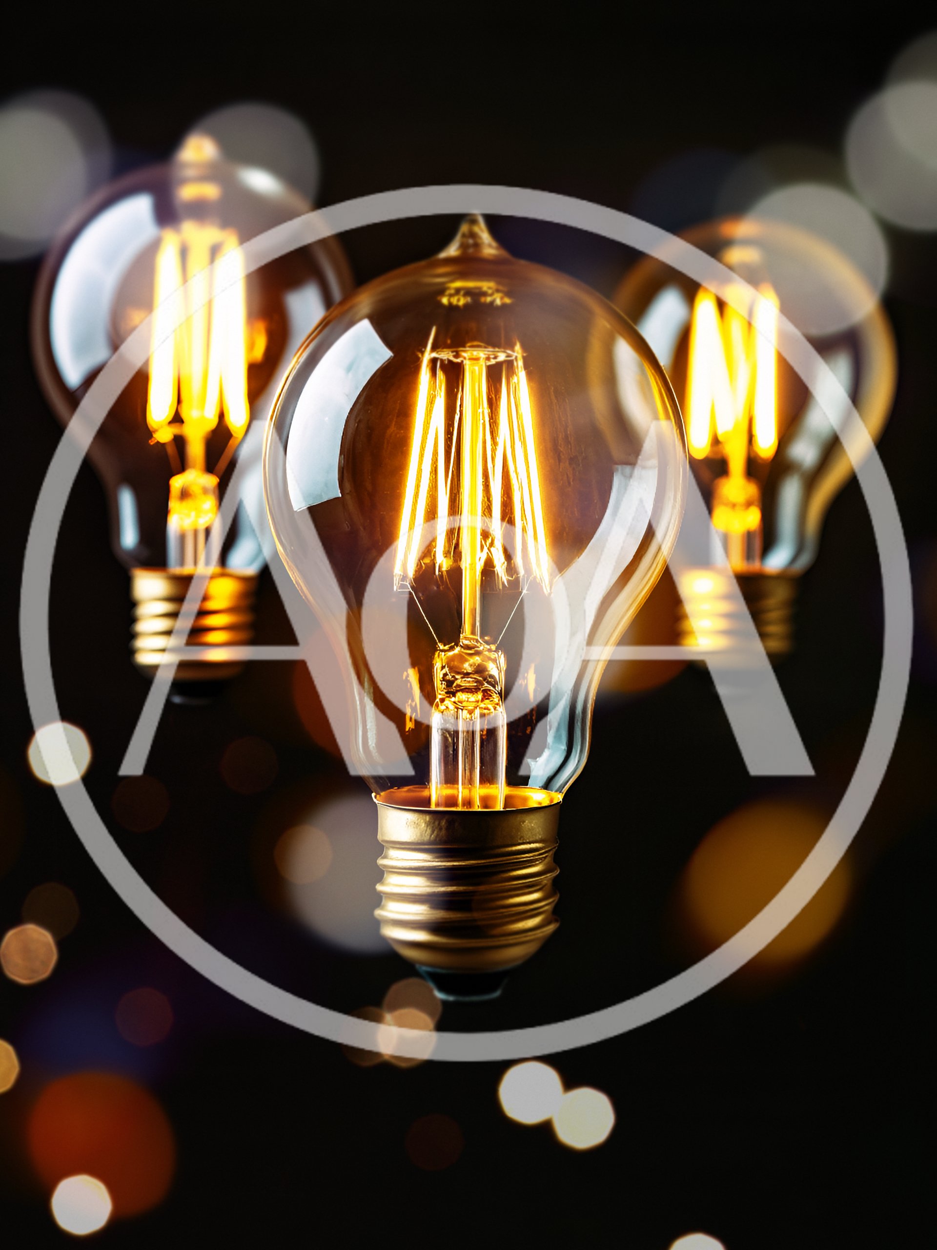 Three Glowing Vintage Edison Light Bulbs