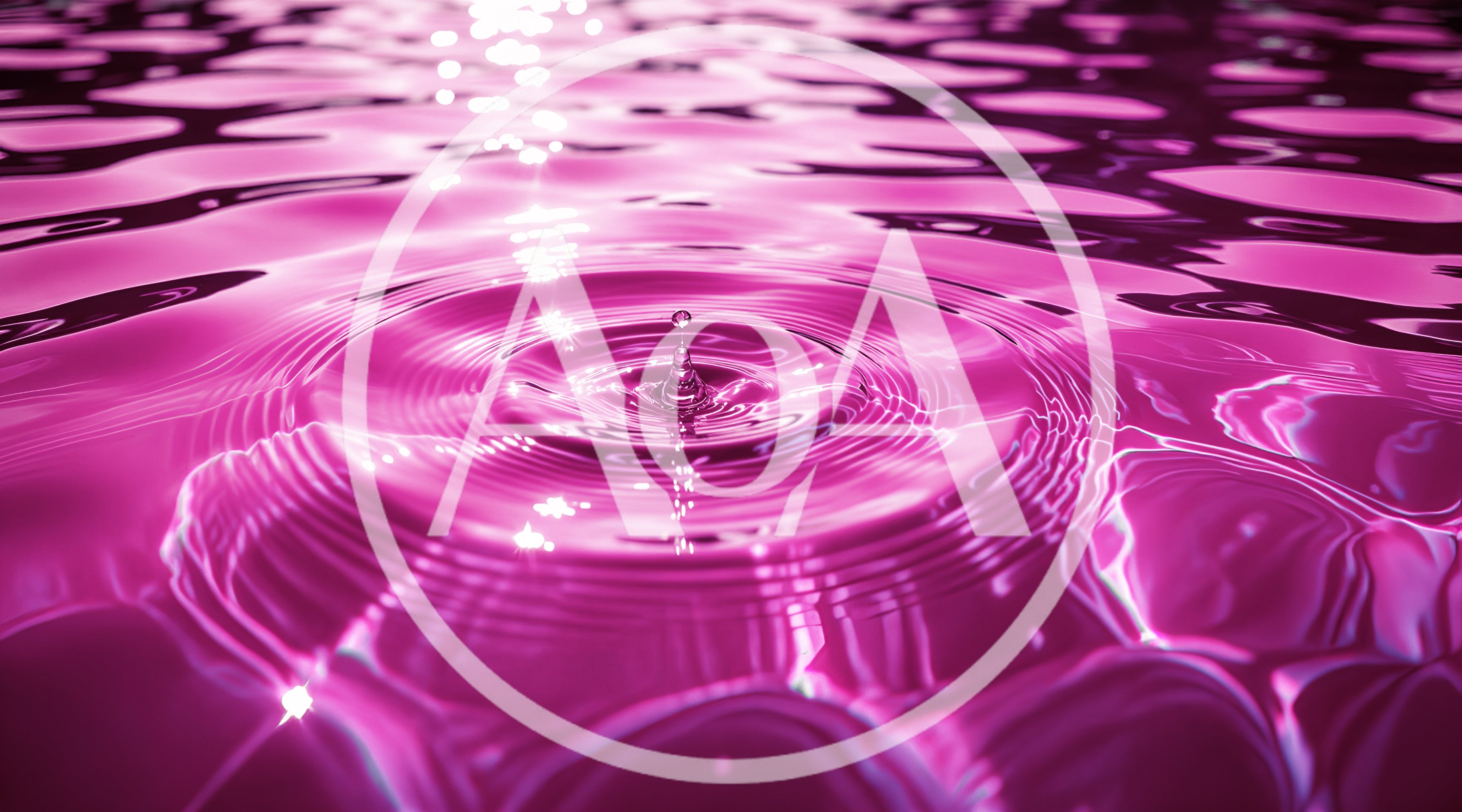 Single Water Drop Creating Concentric Ripples In Pink Liquid