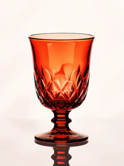 Elegant Red Crystal Goblet On White Background