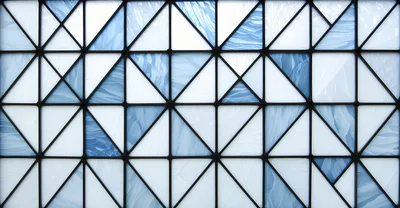Geometric Stained Glass Window With Blue And White Panes