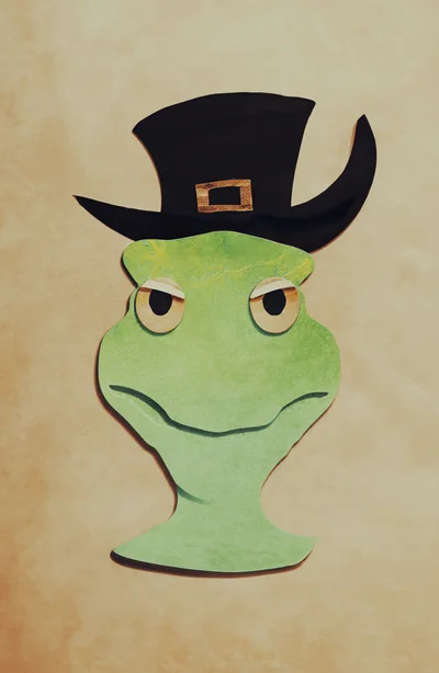 Paper Cutout Frog Wearing A Black Top Hat