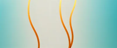 Abstract Background With Golden Wavy Lines On Teal