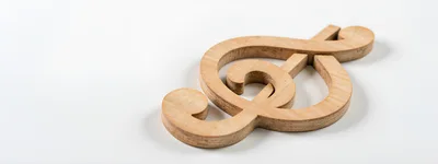 Wooden Treble Clef Music Symbol On White Background