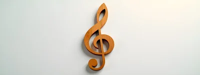 Wooden Treble Clef Symbol On White Background