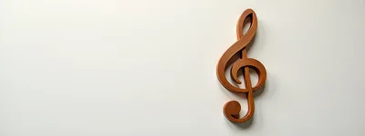 Wooden Treble Clef Symbol on White Background