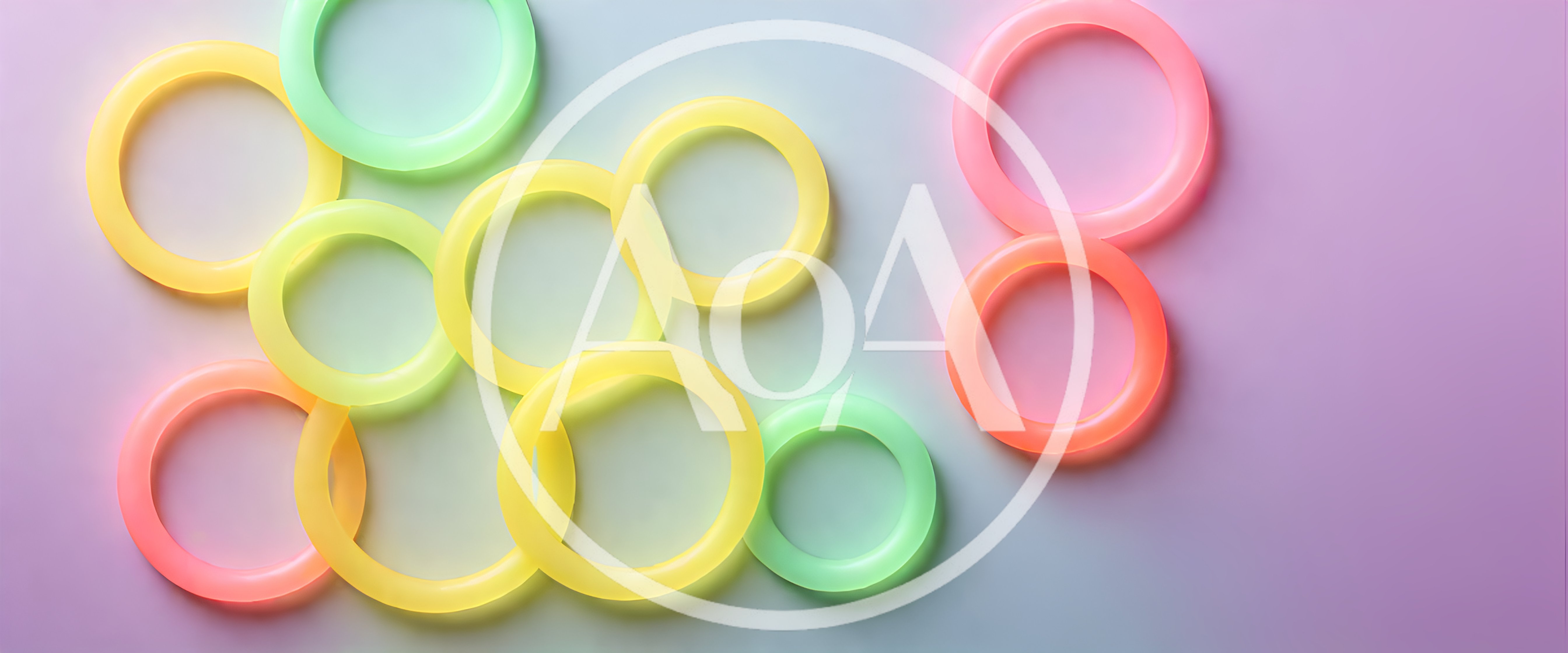 Colorful Glowing Plastic Rings On Gradient Background