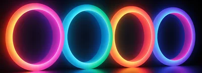 Four Glowing Neon Rings In A Dark Space