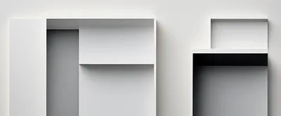 Minimalist Geometric White Shelving Units On Wall