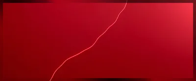 Abstract Red Background With Glowing Diagonal Light Streak
