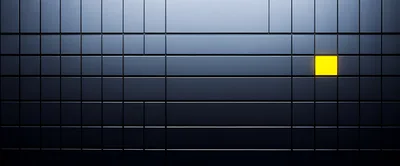 Glowing Yellow Square On A Dark Metallic Grid Wall