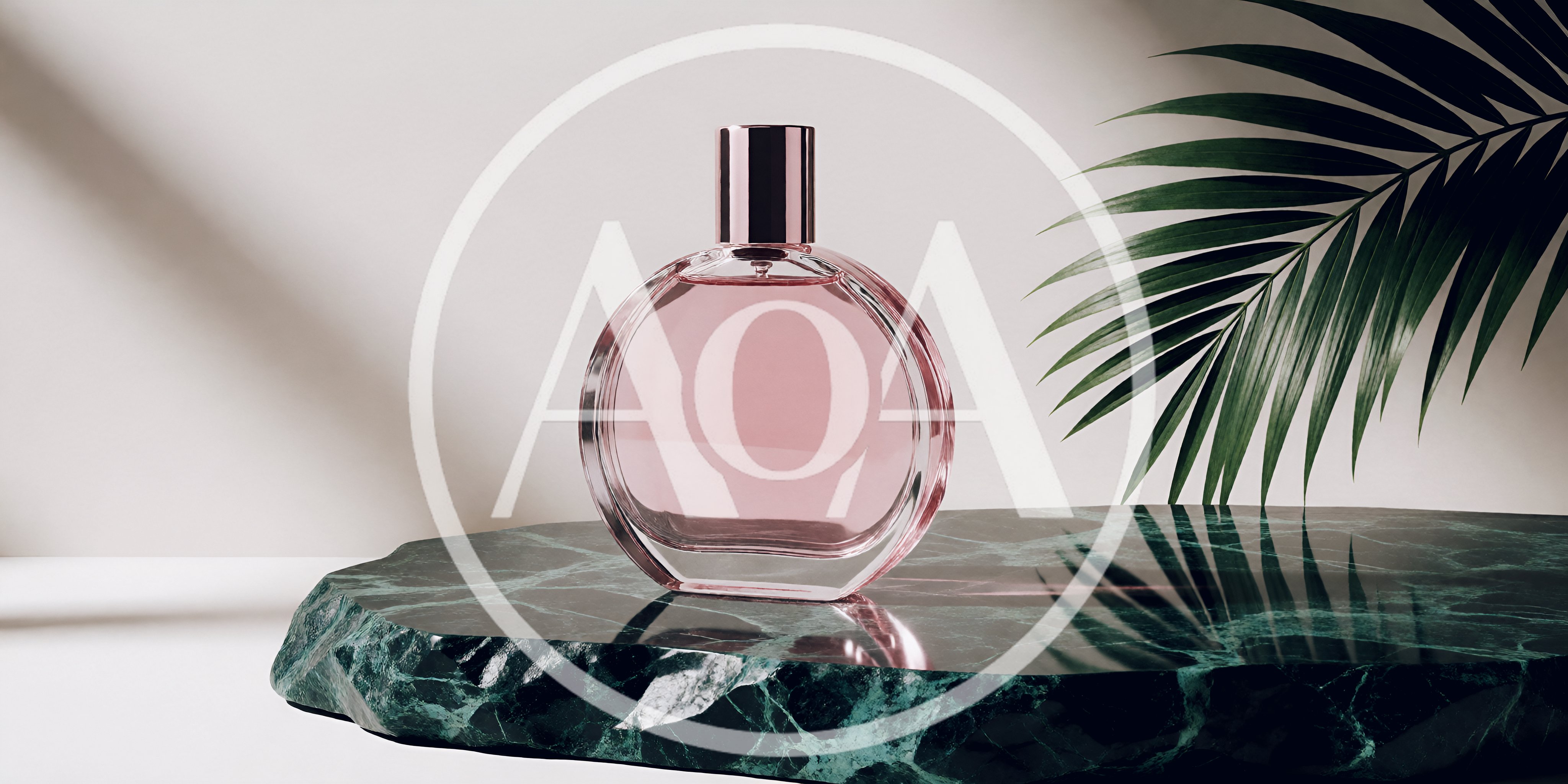 Pink Perfume Bottle On Green Marble Stone