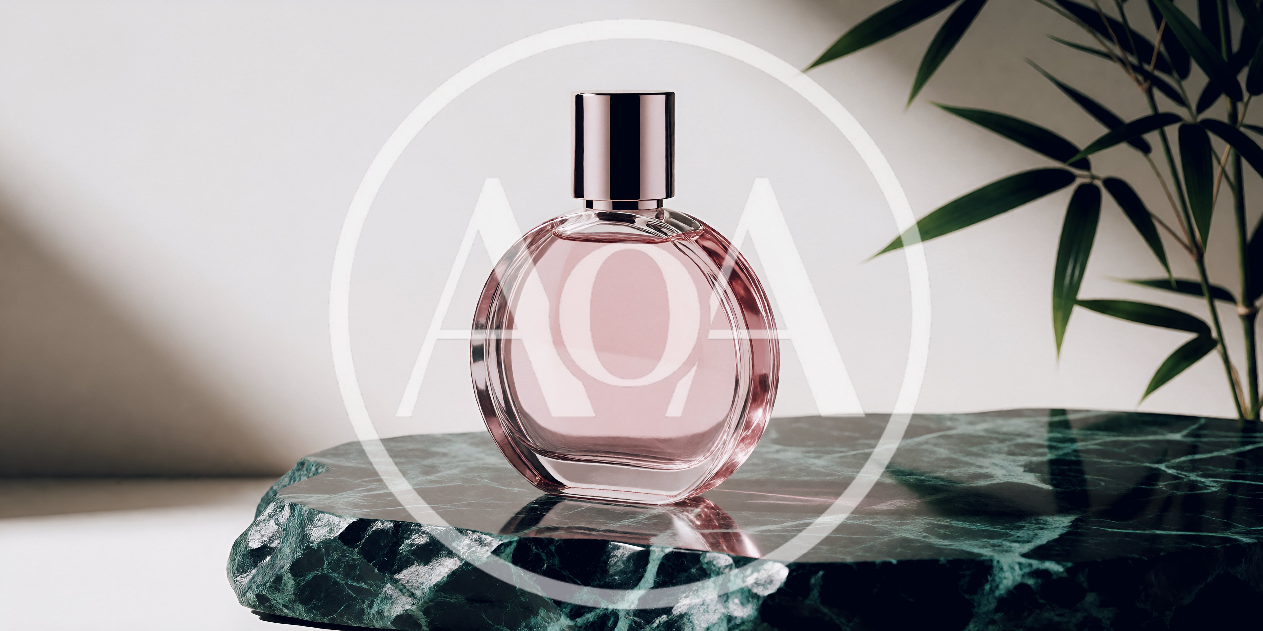 Pink Perfume Bottle On Green Marble Display