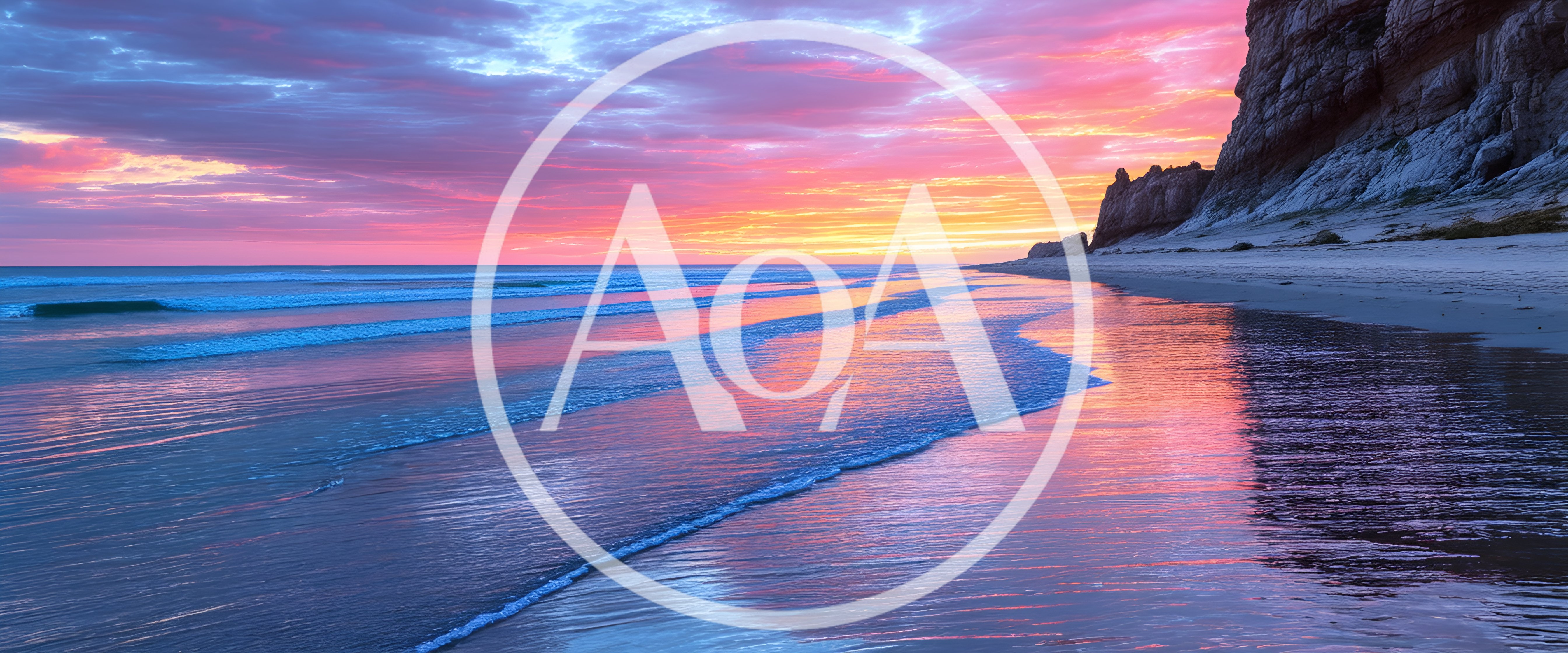 Vibrant Sunset Over A Calm Sandy Beach