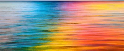 Abstract Motion Blur Of Colorful Sunset Ocean Waves