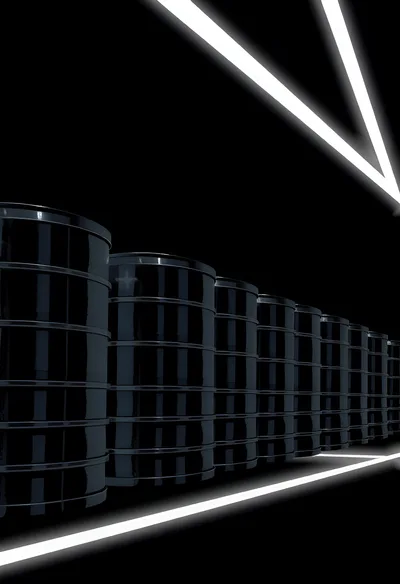 Row of Black Industrial Oil Barrels