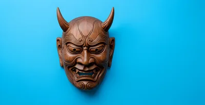 Wooden Hannya Mask On Bright Blue Background