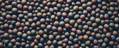Top Down View Of Many Colorful Smooth Stones
