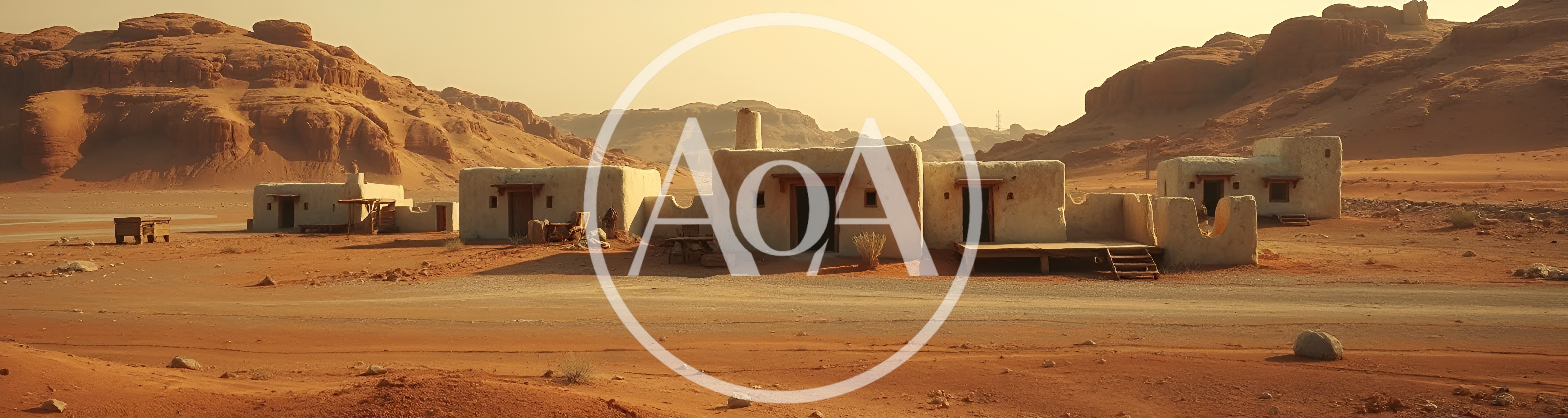 Desert Settlement With Adobe Buildings In Arid Landscape