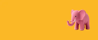 Cute Pink Elephant Toy On Yellow Background