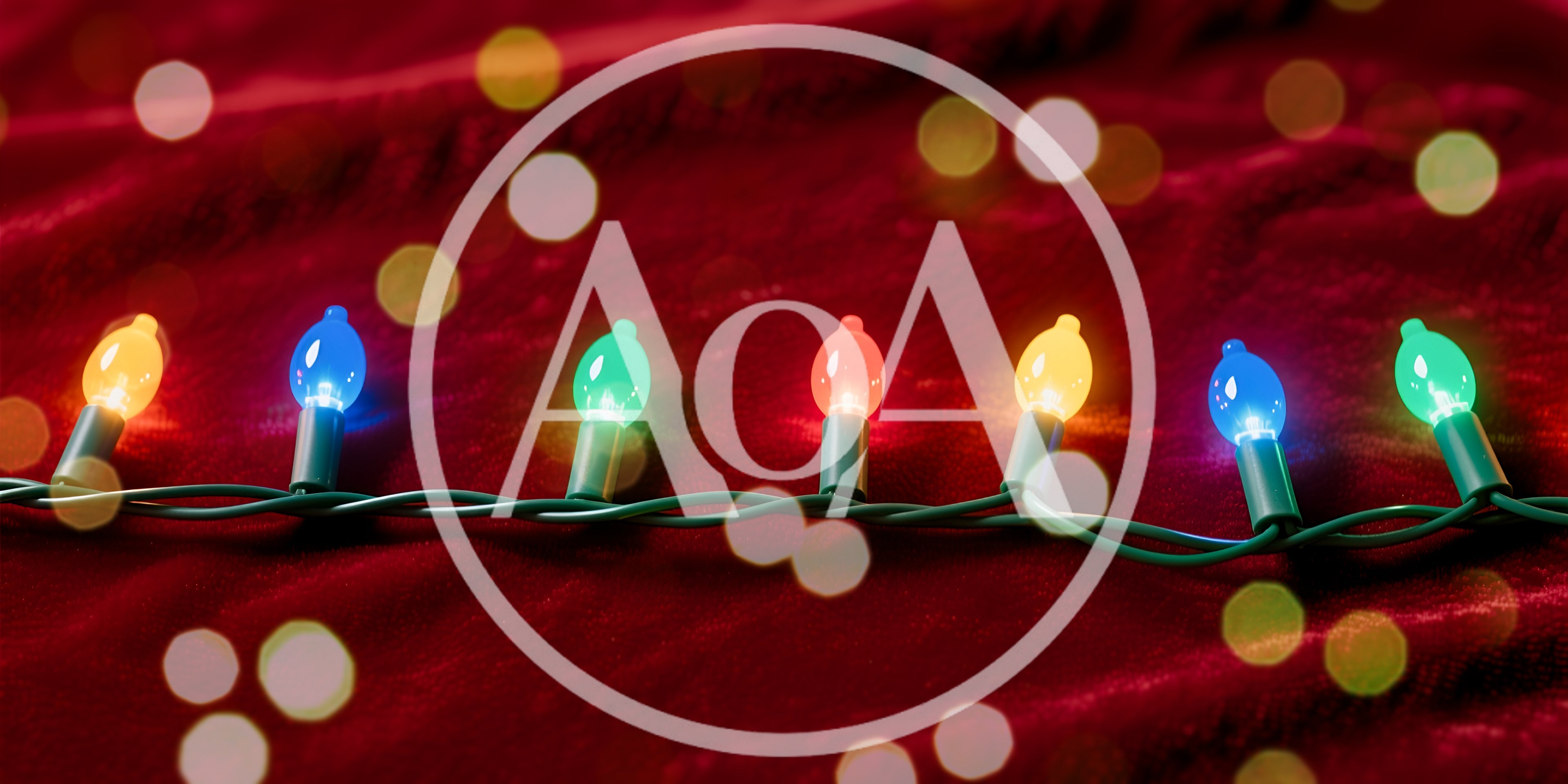 Colorful Christmas String Lights On Red Velvet Fabric