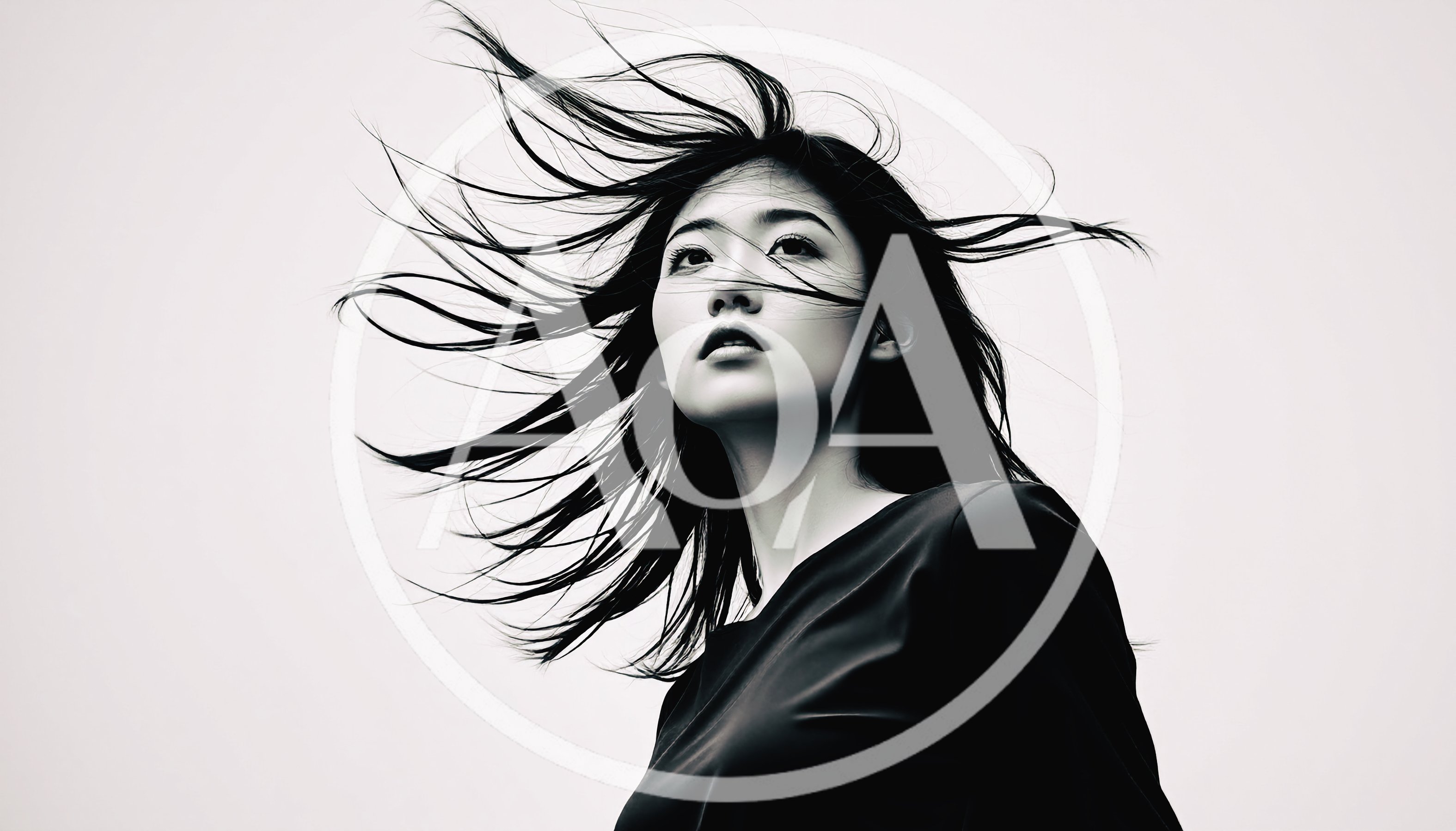 Portrait Of A Young Woman With Windblown Hair