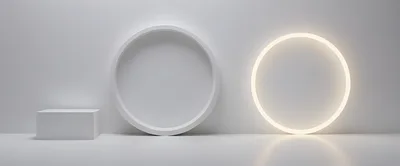 Minimalist White Studio Display With Geometric Shapes