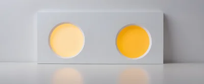 Minimalist White Panel With Two Glowing Circular Lights