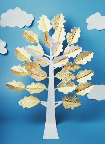Paper Craft Tree With Textured Leaves On Blue Background