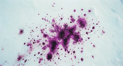 Purple Liquid Splatter On White Snow Surface