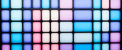 Illuminated Grid Of Colorful Square Music Controller Pads