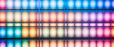 Abstract Grid Of Glowing Colorful Light Panels
