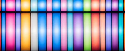 Abstract Background Of Vertical Colorful Illuminated Light Panels