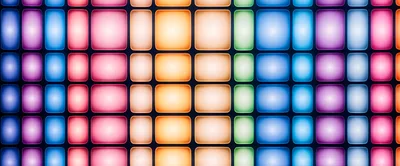 Abstract Background Of Glowing Colorful Square Light Panels