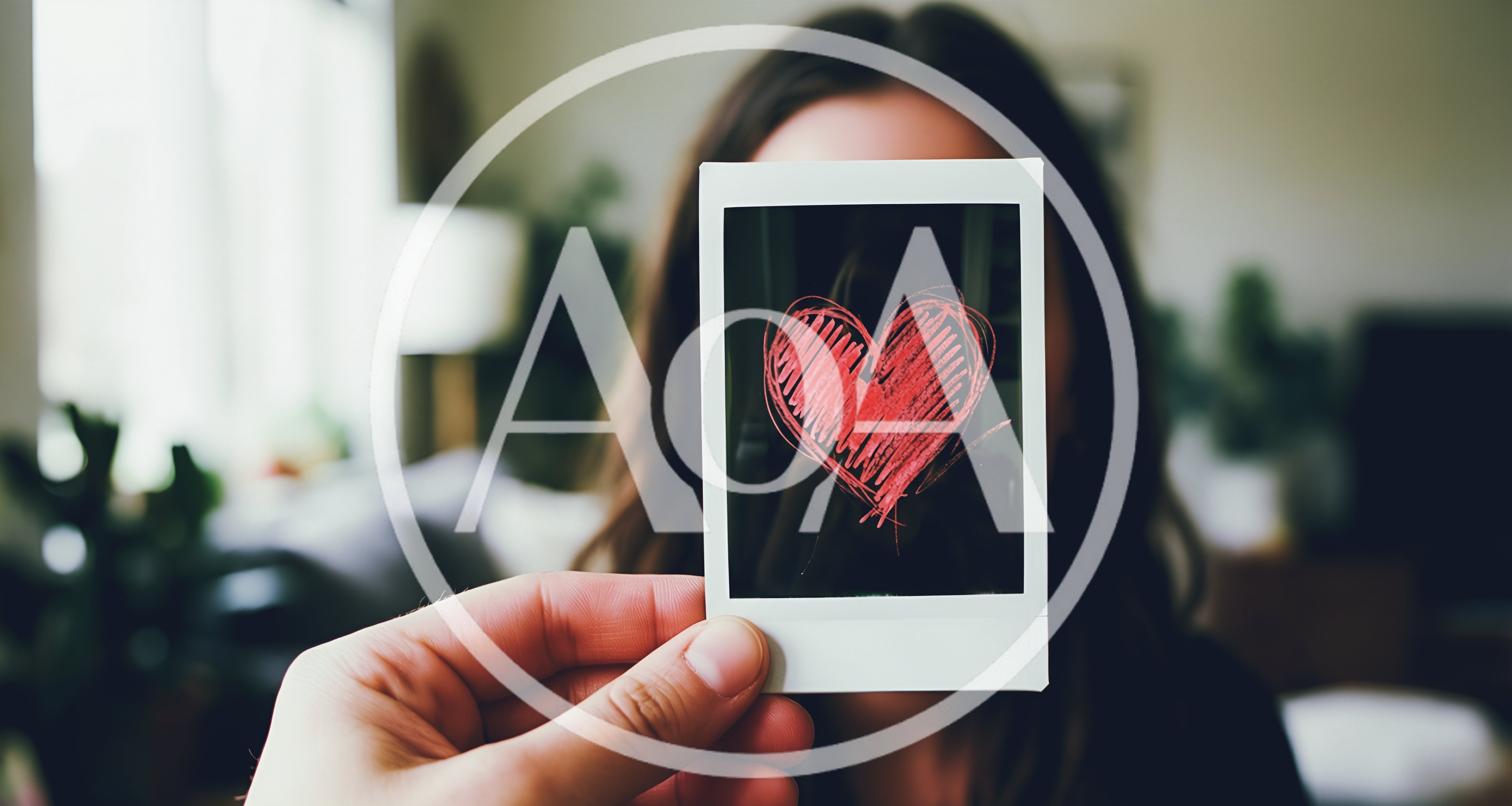 Person Holding A Polaroid Photo With A Red Heart