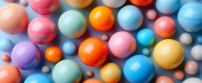 Colorful Glossy Spheres Arranged On A Blue Background