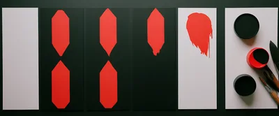 Abstract Red Geometric Shapes Painted On Black Canvases