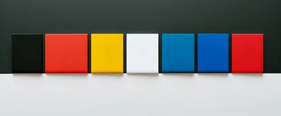 Seven Colorful Rectangular Panels Arranged On A Split Background