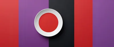 White Plate With Red Center On Multicolored Background