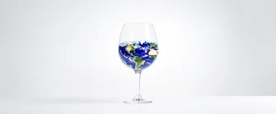 Planet Earth Inside A Glass Of Water