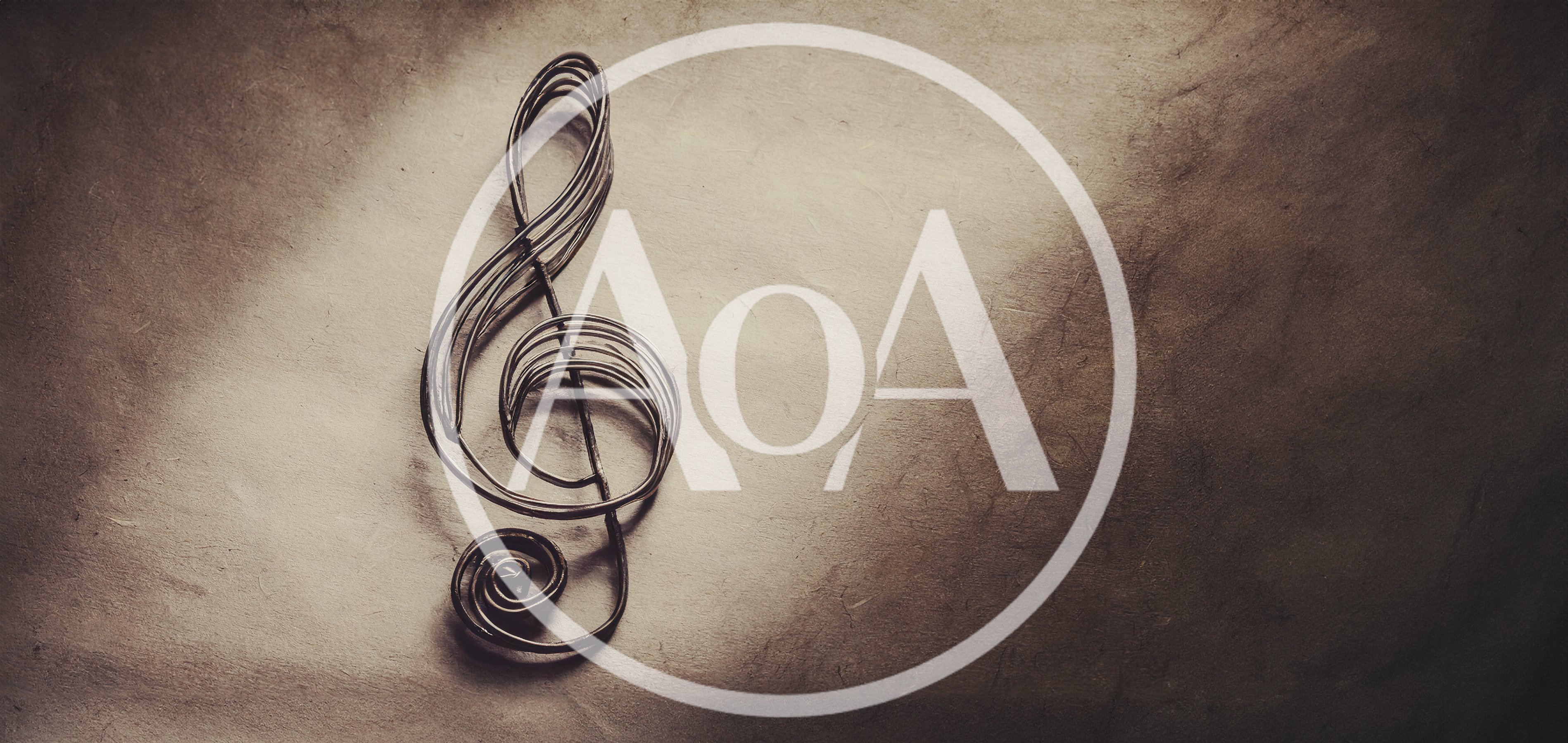 Metal Treble Clef Sculpture On Textured Paper Background