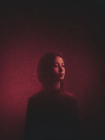 Portrait Of A Woman In Red Lighting