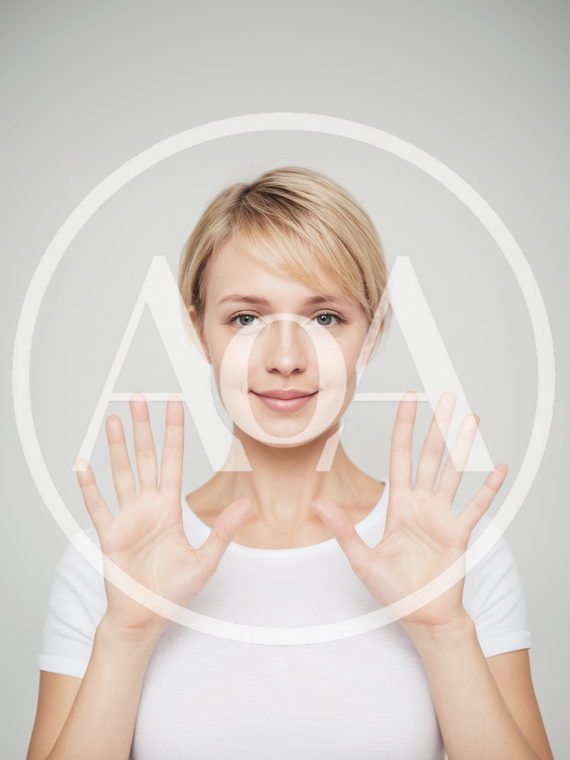 Young Woman Showing Ten Fingers Against Grey Background