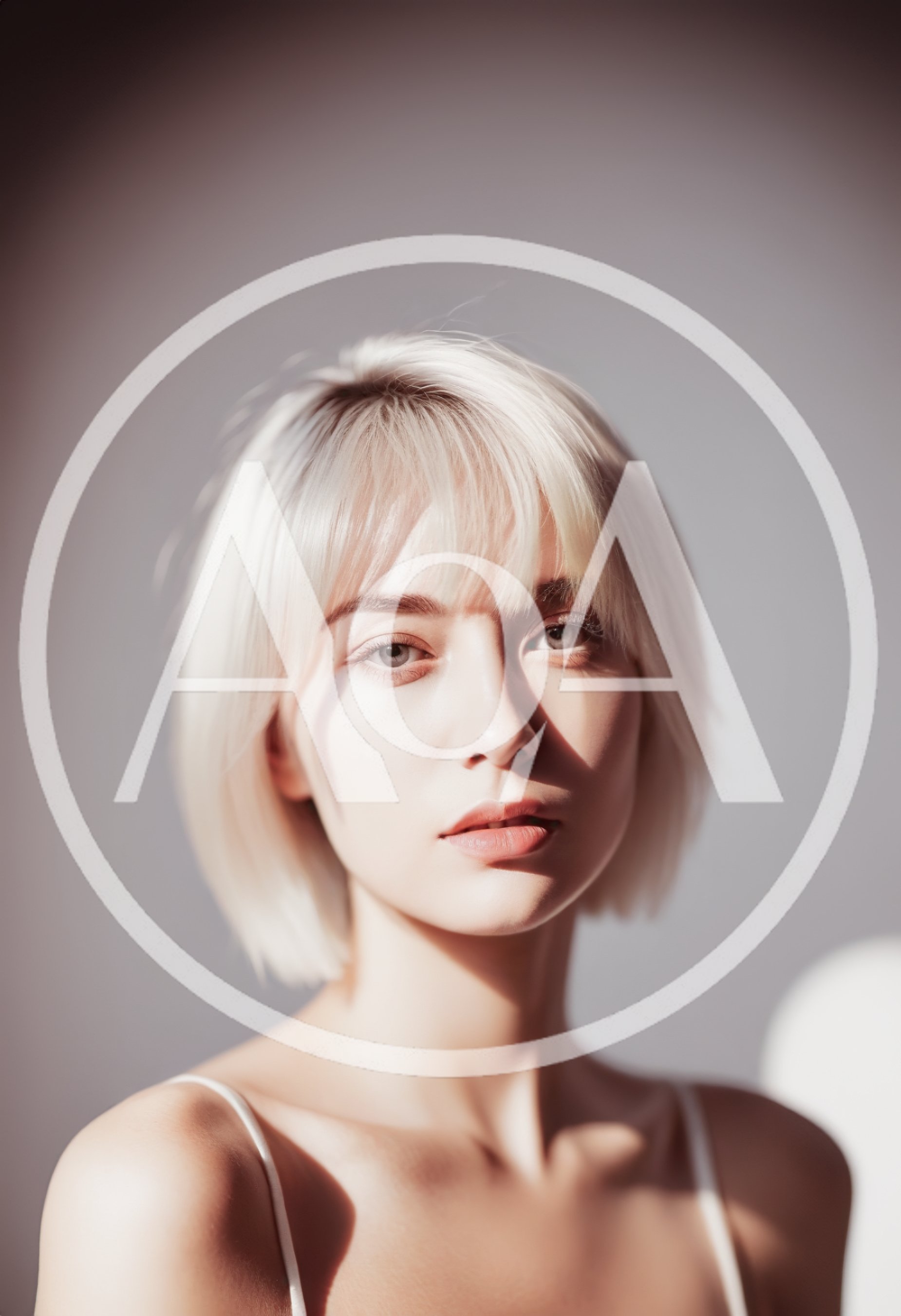 Portrait Of A Young Woman With Blonde Bob Hair