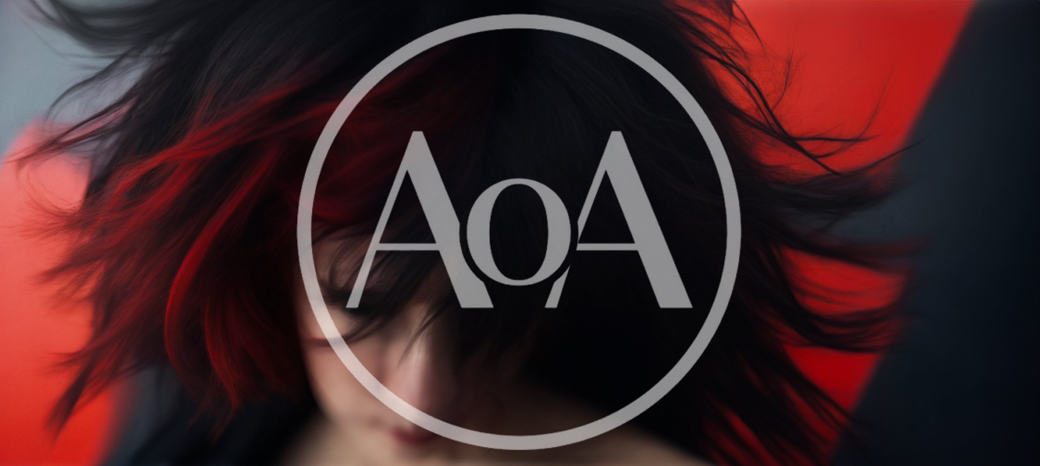 Woman With Black And Red Hair Flipping Her Head